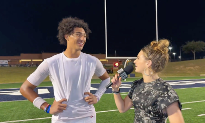 Oakridge WR and TCU comit talks to Taylor Arenz after a win.